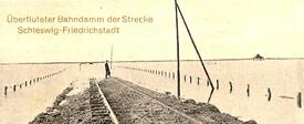 1911 Nach Deichbruch überfluteter Bahndamm 