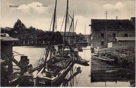1915 Rosengarten mit der Wilsterau und dem Hafen in der Stadt Wilster