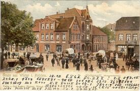 1899 Wochenmarkt auf dem Marktplatz in der Stadt Wilster